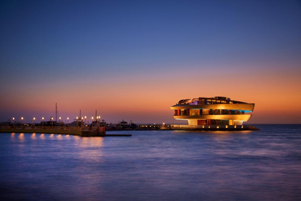 Four Seasons Hotel Dauhá Exteriér fotografie The casino at night